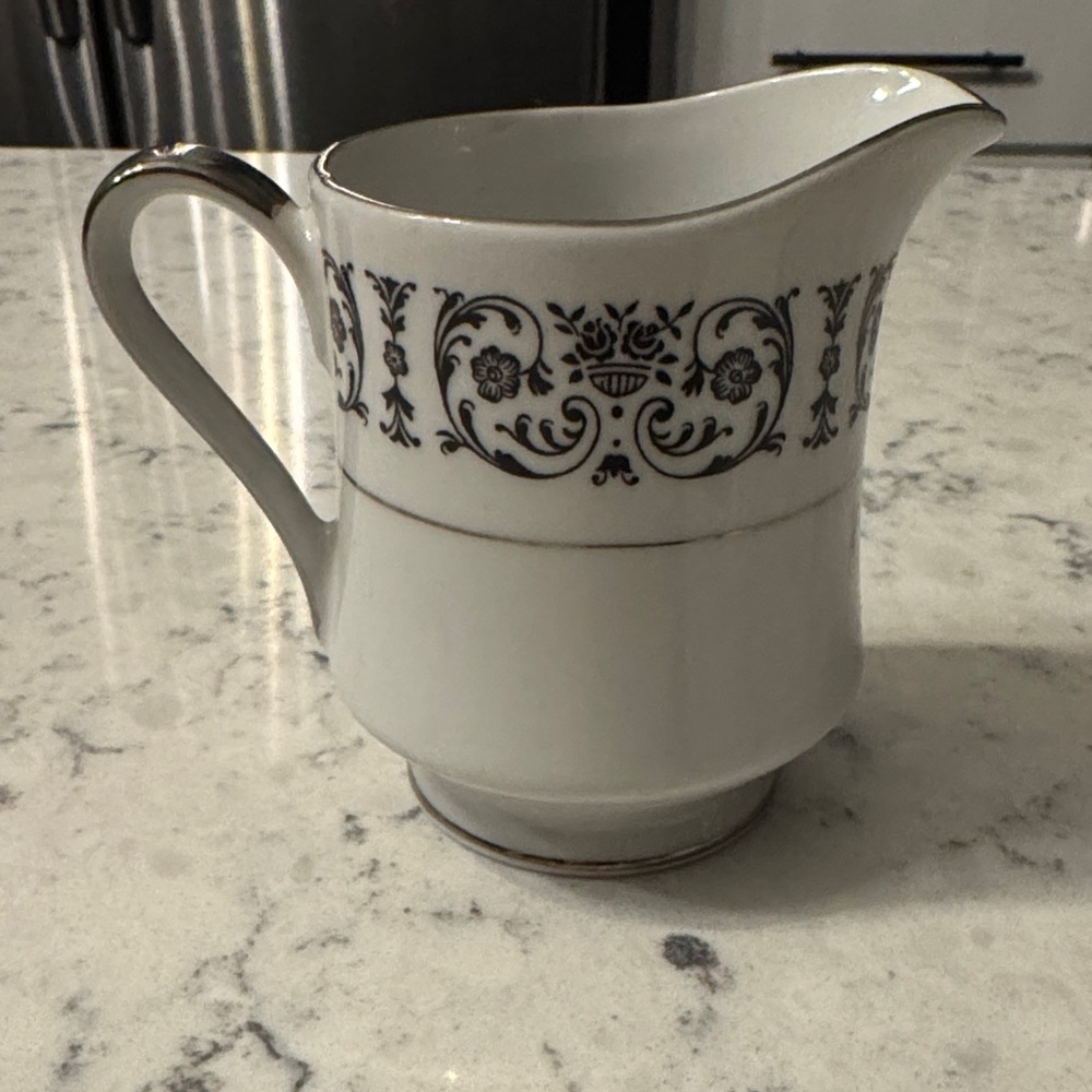 Vintage Royal Song China Creamer with silver trim. Black intricate design